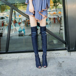 Fish mouth cow carefully followed by knee boots, stovepipe stretch boots