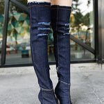 Fish mouth cow carefully followed by knee boots, stovepipe stretch boots